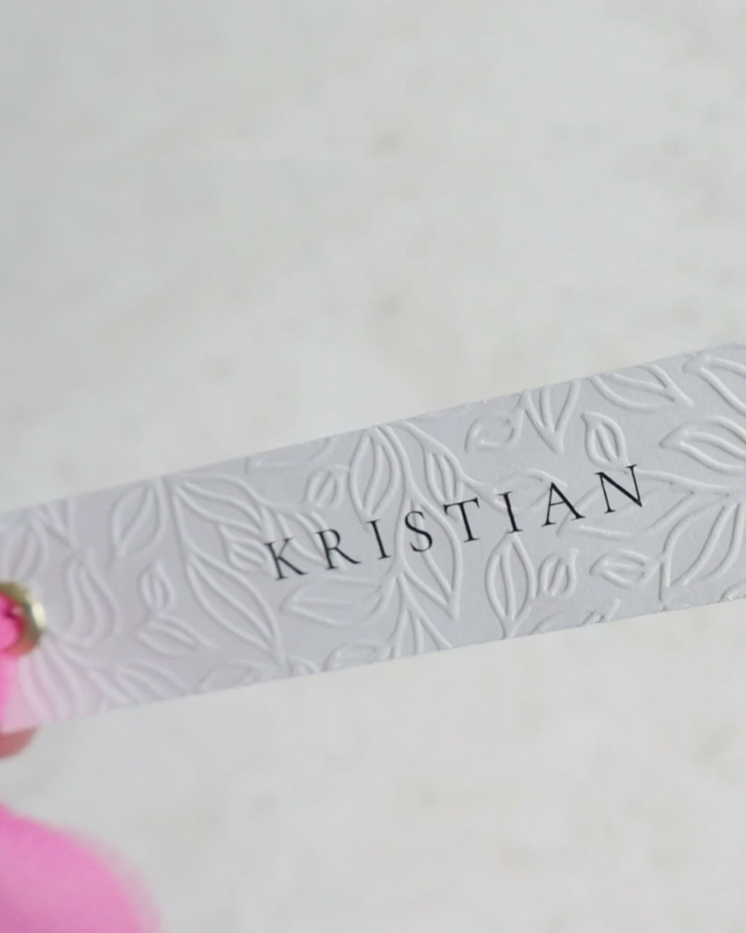 Bordkort med opphøyd preg og bånd